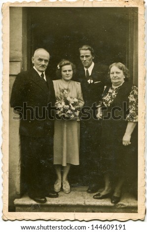 DABROWA GORNICZA, POLAND, CIRCA FIFTIES - vintage photo of unidentified newlyweds with parents, D?browa GÃ?Â³rnicza, Poland, circa fifties