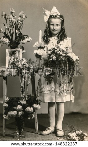 LODZ, POLAND, CIRCA FIFTIES - vintage photo of little girl (First Communion), Lodz, Poland, circa fifties