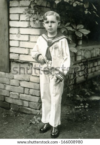 GANSERNDORF, AUSTRIA, CIRCA 1930s - Vintage photo of little boy in sailor outfit,  Ganserndorf, Austria, circa 1930s