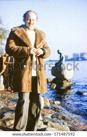 Vintage photo (scanned reversal film) of man in sheepskin coat in Copenhagen (1979)
