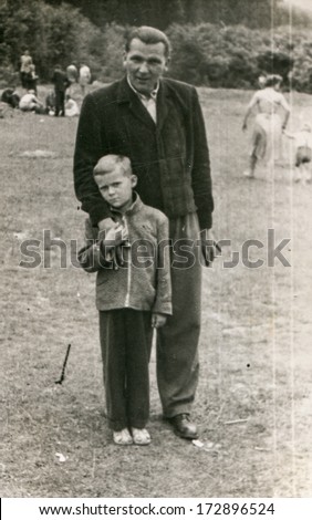 WEGIERSKA GORKA, POLAND, CIRCA FORTIES - Vintage photo of man and son