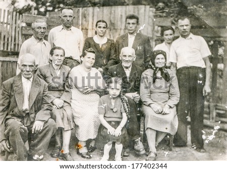KOSTOPIL,UKRAINE, SEPTEMBER 30, 1960 - Vintage photo of farmers family