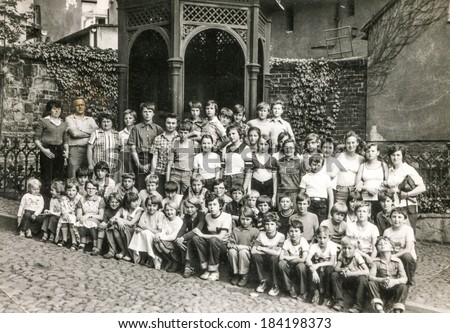 POLAND, CIRCA 1970's: Vintage photo of group of classmates and teachers posing together  during a school excursion
