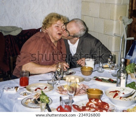 Vintage photo of elderly couple\'s wedding anniversary, eighties
