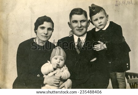 GERMANY, CIRCA 1940s: Vintage photo of parents with their children