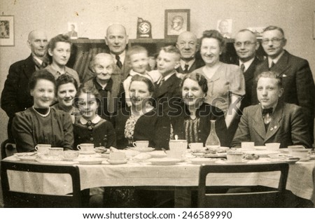 GERMANY, CIRCA THIRTIES: Vintage photo of big family during a family meal