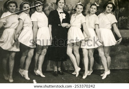 BERLIN, GERMANY, CIRCA 1930\'s: Vintage photo of young ballet students with their teacher