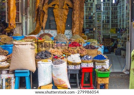 MARRAKESH, MOROCCO, APRIL 4, 2015: Display of natural herbal products and animal leathers (crocodile, snake) in souks