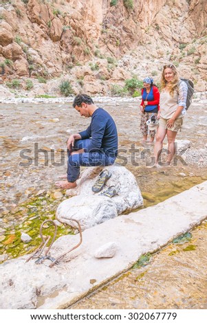 Tourists enjoying Todgha river in Todgha Gorge, Morocco