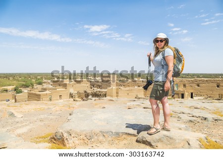 Tafilalt oasis in Morocco -  tourist looking view from Tingheras ksar