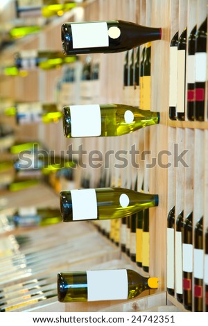 Wine shop, bottles on shelfs