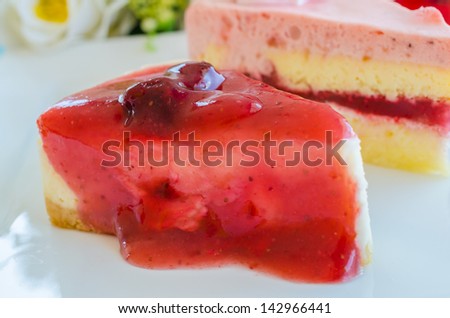 Strawberry cheese cake on white dish