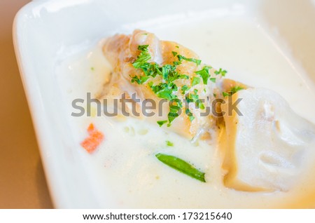 Fish with white sauce and mushroom