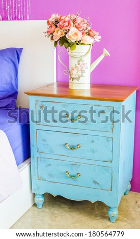 Interior bed room vase flower on wood beside bed table