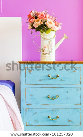 Interior bed room vase flower on wood beside bed table