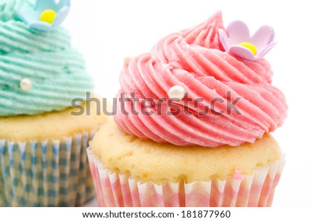 Vanilla cupcakes isolated white background