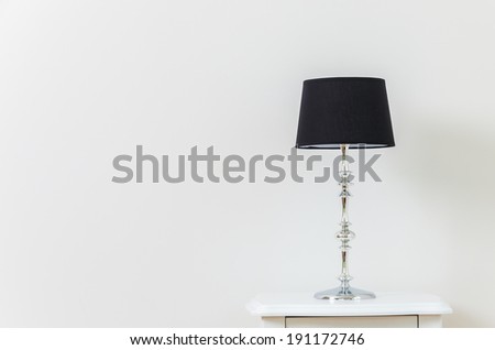 Lamp on bedside table interior room