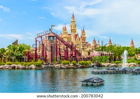 SINGAPORE-JUNE 25: beautiful castle and roller coaster in Universal studio on JUNE 25, 2014. Universal Studios Singapore is theme park located within Resorts World Sentosa,Singapore.