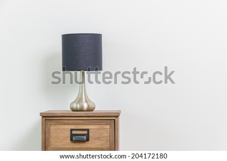 Lamp on bedside table interior room