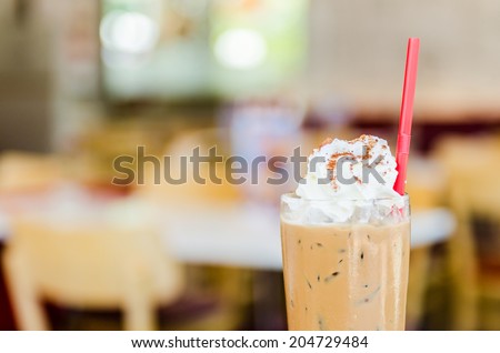 Iced mocha coffee with whip cream on top