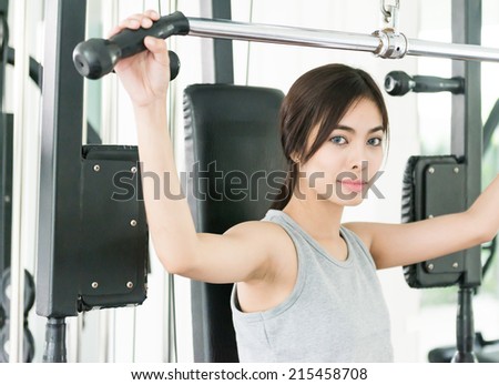 Woman workout at fitness gym