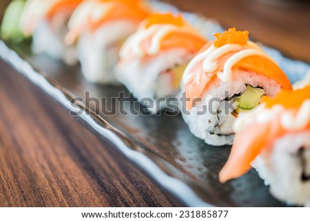 Raw fresh Salmon sushi roll maki - japanese food