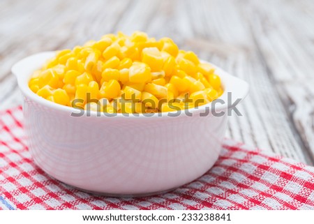 Sweet corn bowl on wooden background
