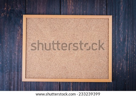 Blank board on wooden background - vintage effect style pictures