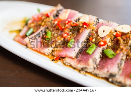 Spicy tuna salad japanese food - selective point focus