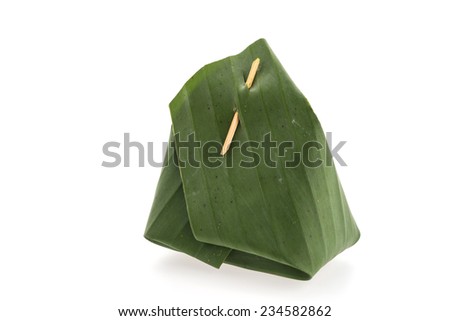 Banana leaf packaging sticky rice isolated on white background