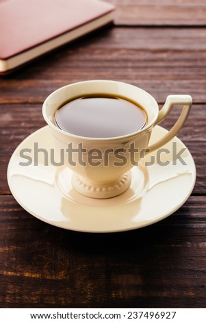 Coffee mug on wood background - Vintage effect style pictures