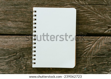 Blank note book paper on wooden background - Vintage effect style pictures