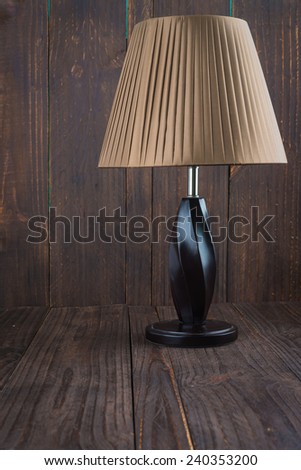 Lamp on wood background - vintage effect style