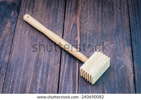Hammer on wooden background - vintage effect style pictures