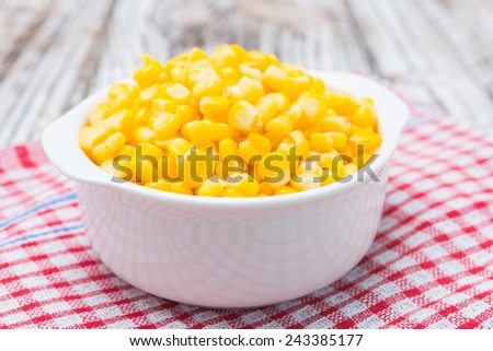 Sweet corn bowl on wooden background