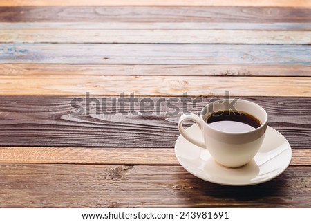 Black coffee in white cup in coffee shop - Vintage effect pictures style