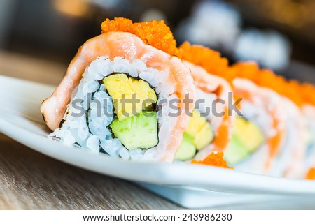 Salmon sushi roll japanese food style - selective focus point