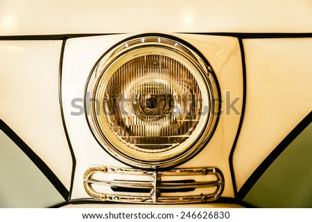 Selective focus point on light lamp on vintage car - vintage effect style pictures