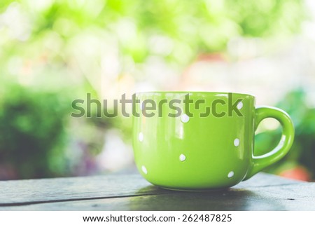 Coffee mug on wooden table - Vintage effect style pictures