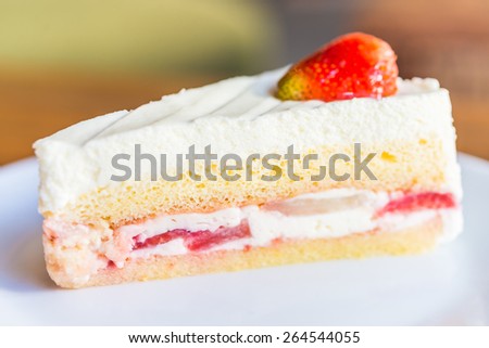 Strawberry cream cakes on white plate