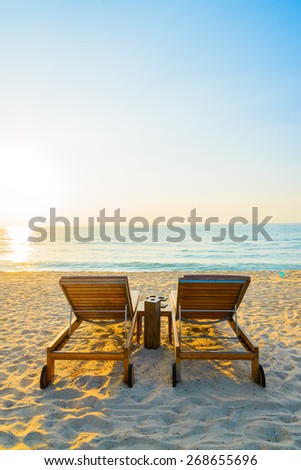 Beach bed with sun flare twilight time