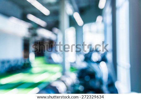 Abstract blur gym fitness background - blue color white balance effect