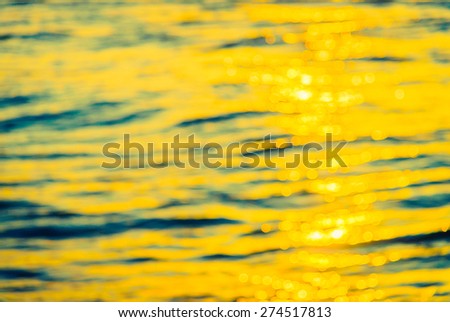 Blur Sunrise on sea background - vintage filter