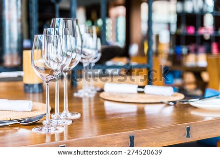 Selectiv soft focus on Wine glass on dining table in restaurant