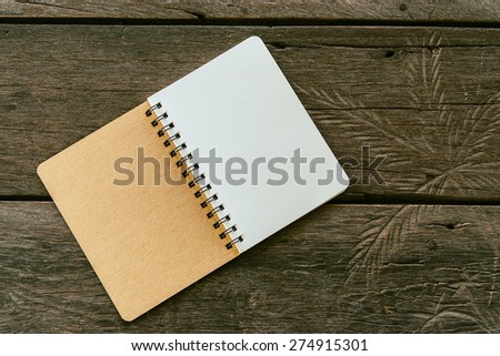 Blank note book paper on wooden background - Vintage effect style pictures
