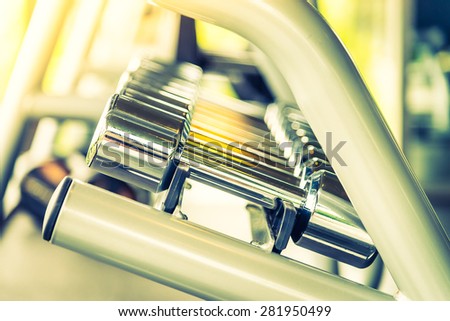 Selective soft focus point on Dumbbell - vintage filter and sunflare effect