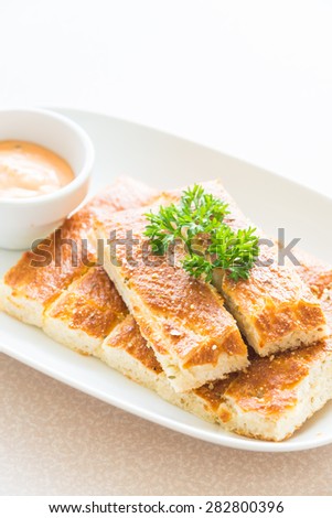 Bread stick with sweet sauce