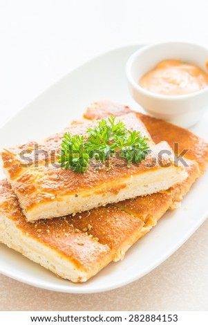 Bread stick with sweet sauce