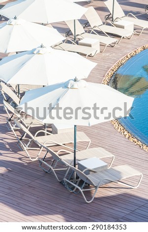 Pool chair with umbrella