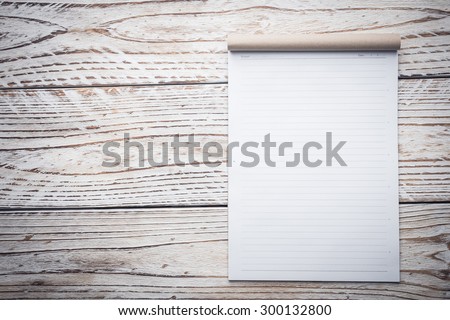 Blank white paper mock up on white wood background - filter effect